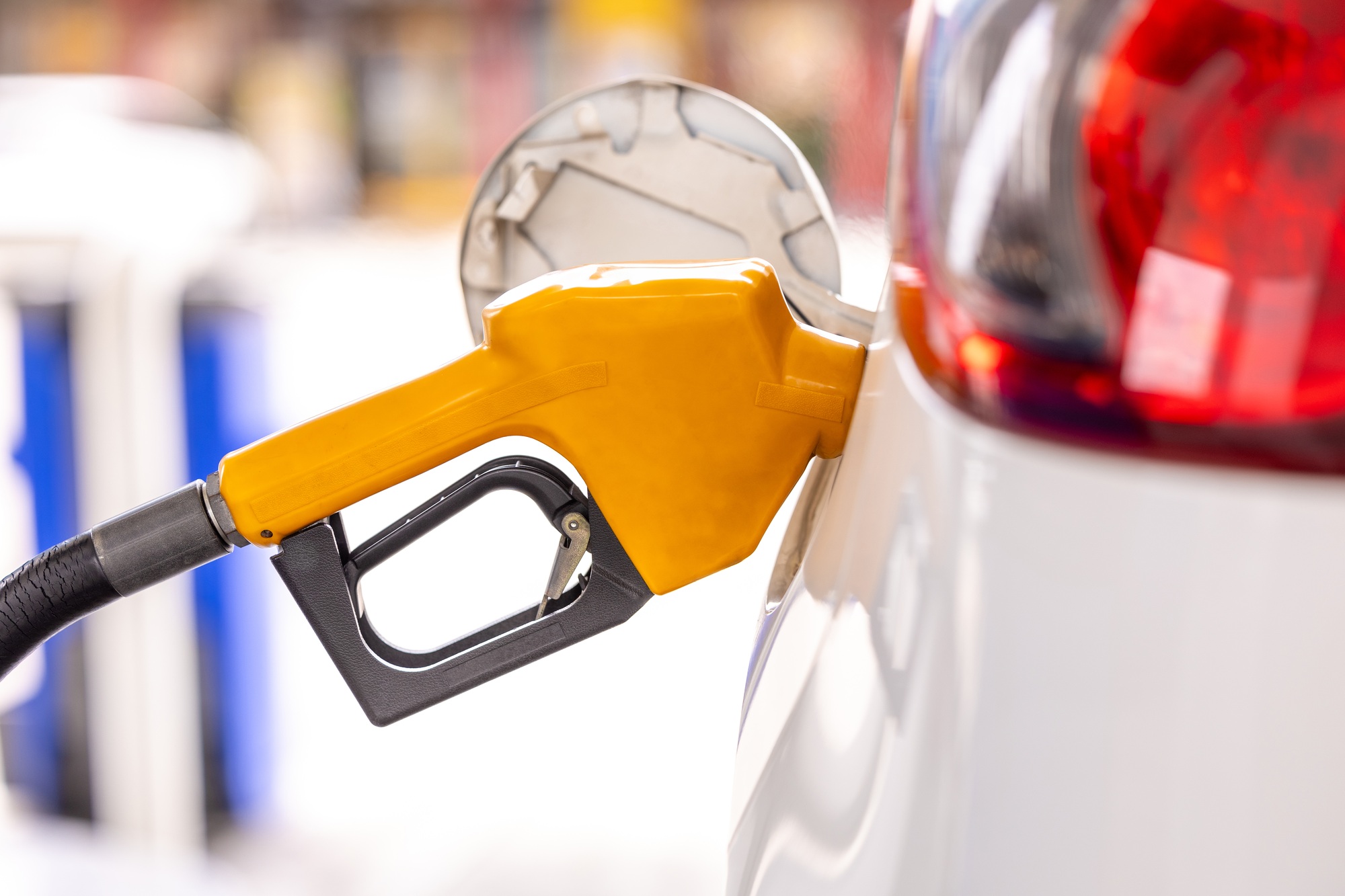 Refill and filling Oil Gas Fuel at station. Gas station - refueling. To fill the machine with fuel.